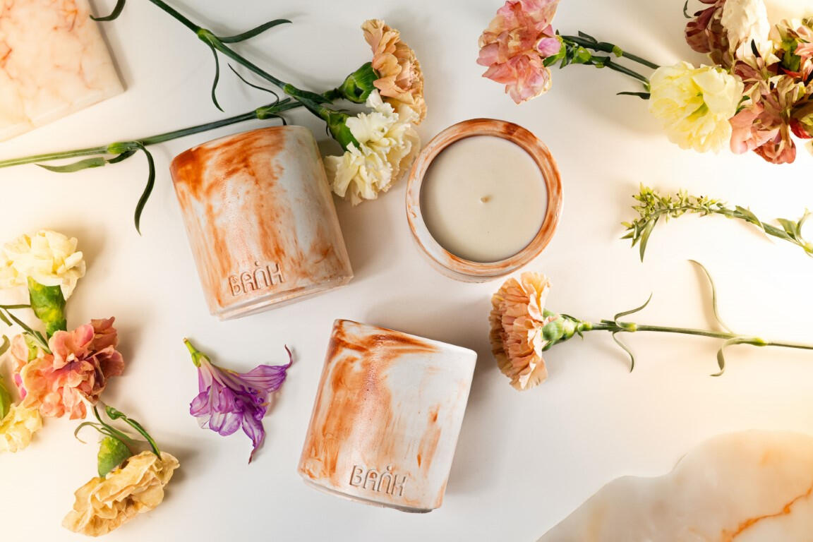 Grafika przedstawiająca zdjęcia produktów wykonanych przez Pawła Bezubika, z naciskiem na profesjonalne oświetlenie i kompozycję.